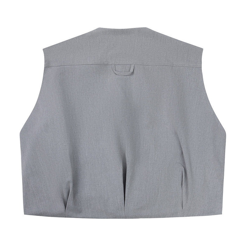 Rückansicht der Off the Pitch Oversized Xan Gilet - Ultimate Grey mit minimalistischem Design und Nahtdetails