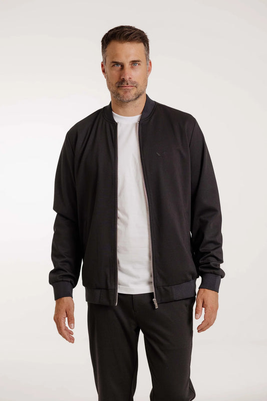 Eleganter Kleinigkeit Peter Maffein Blouson in Schwarz mit gestickter Doppelfeder auf der Brust und geripptem Saum für einen modernen Look.