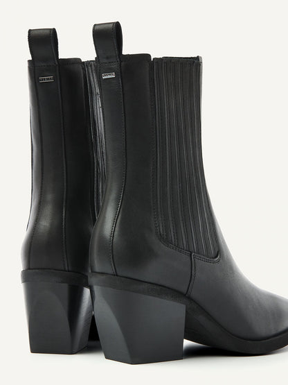 Rückansicht der Nubikk Liv Loua Metal Black Leather Stiefeletten mit Blockabsatz und tonalem Elastik-Einsatz