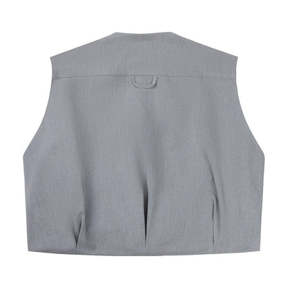 Rückansicht der Off the Pitch Oversized Xan Gilet - Ultimate Grey mit minimalistischem Design und Nahtdetails