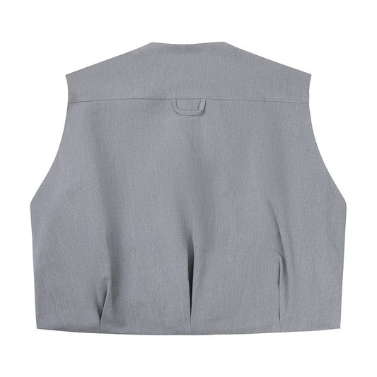 Rückansicht der Off the Pitch Oversized Xan Gilet - Ultimate Grey mit minimalistischem Design und Nahtdetails