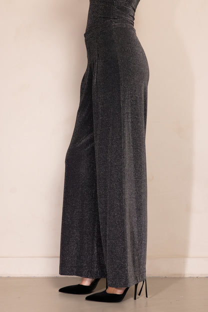 Zhrill Pala - Anthra Glitzerhose seitlich fotografiert, betont die fließende Passform und schimmernde Struktur.