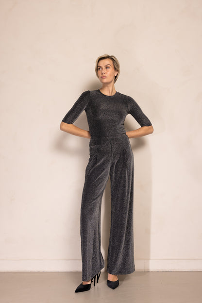 Zhrill Pala - Anthra Glitzerhose in eleganter Vollansicht mit weitem Bein und figurbetontem Schnitt.